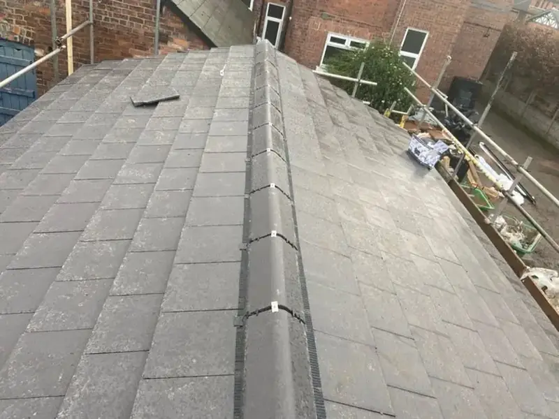 Newly tiled extension roof seen from the scaffold