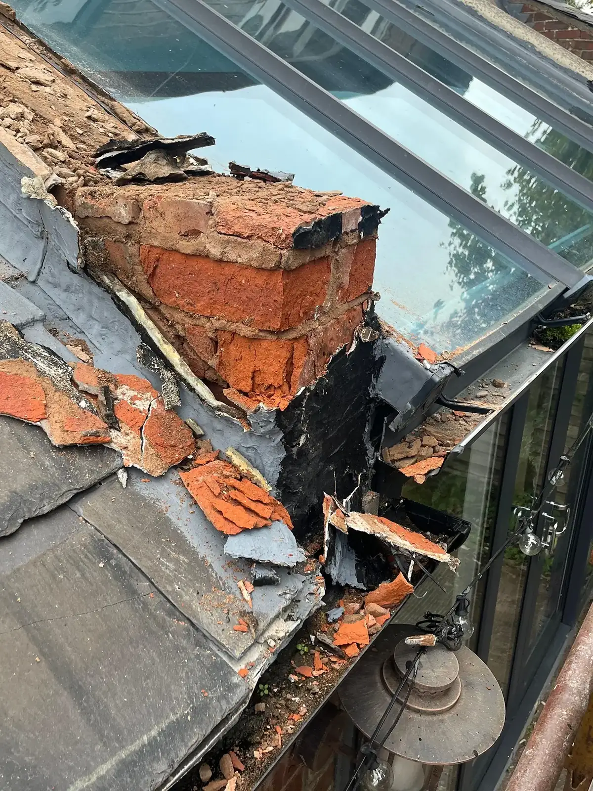 Chimney breast removed at roof level with a new rooflight alongside
